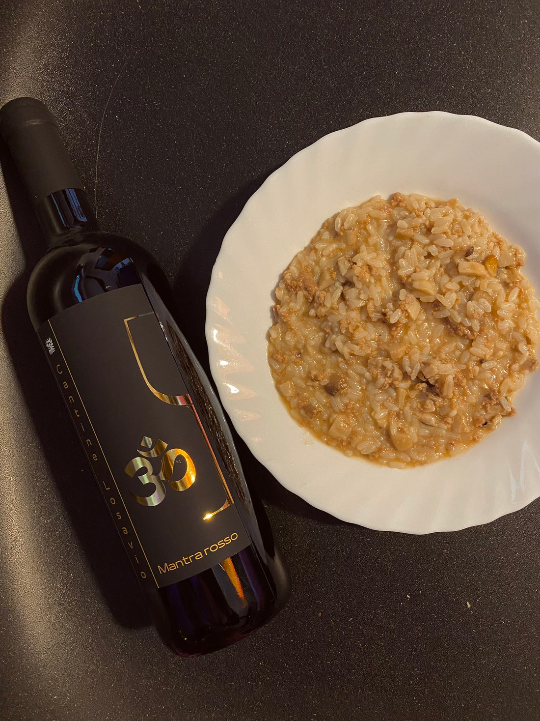 abbinamento cibo-vino mantra rosso, primitivo, lambrusco e risotto salsiccia e funghi